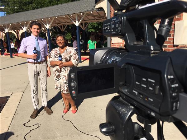 Students speaking to camera